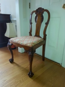 The chair rebuilt, French polished and ready for use.