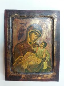 The icon after restoration with the gesso replaced and the lifting paint in-painted with gouache.